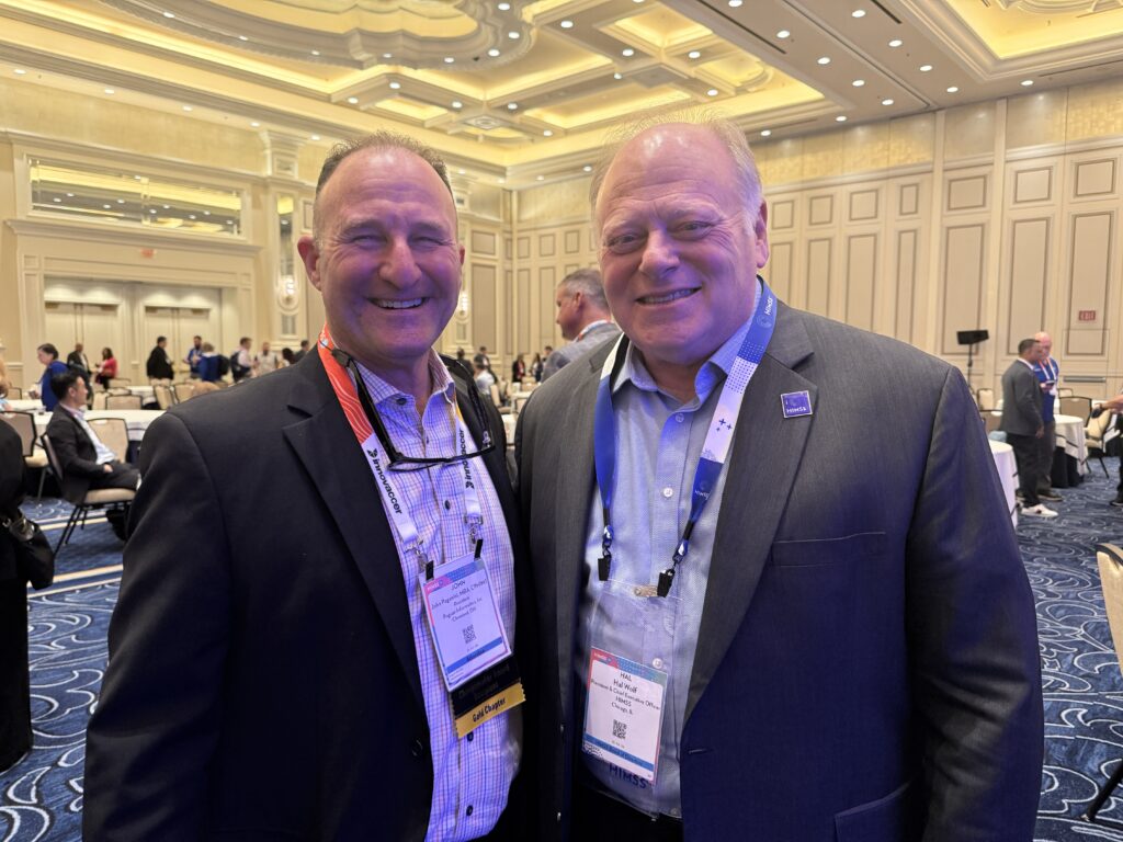 John Paganini and HIMSS CEO Hal Wolf at HIMSS 2026 Conference in Las Vegas